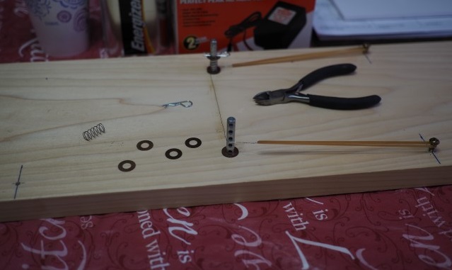 Jim Annerton's design solved the problems that I was having with shims.